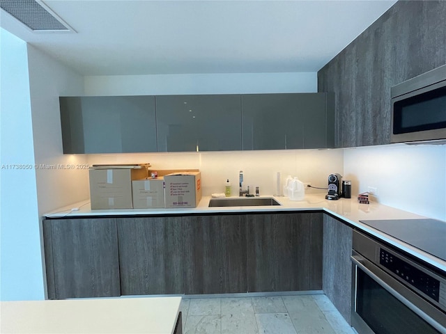 kitchen with stainless steel appliances and sink