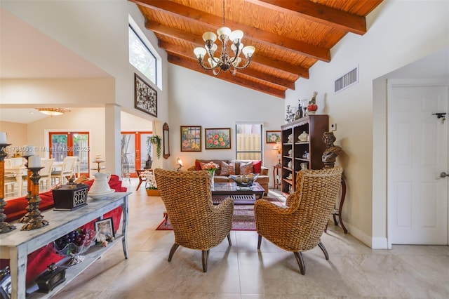 living area with beamed ceiling, high vaulted ceiling, wooden ceiling, and a chandelier