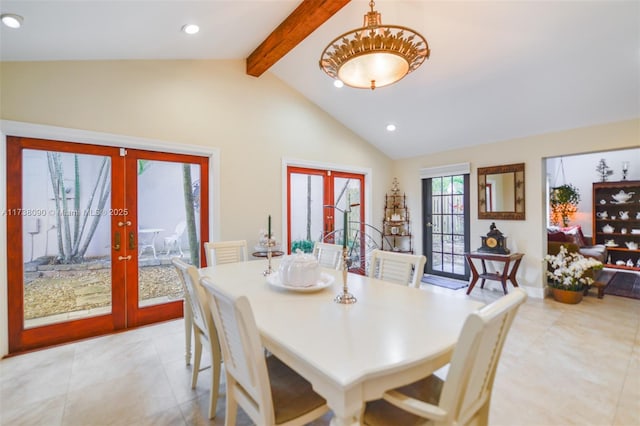 tiled dining room featuring french doors, beam ceiling, and high vaulted ceiling