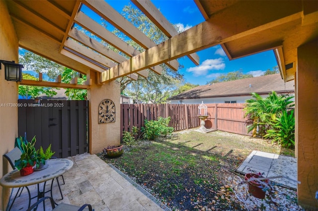 view of yard with a pergola and a patio area