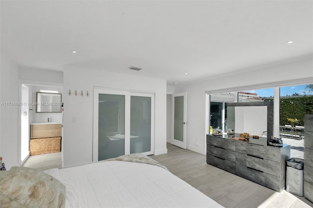 bedroom featuring light hardwood / wood-style floors