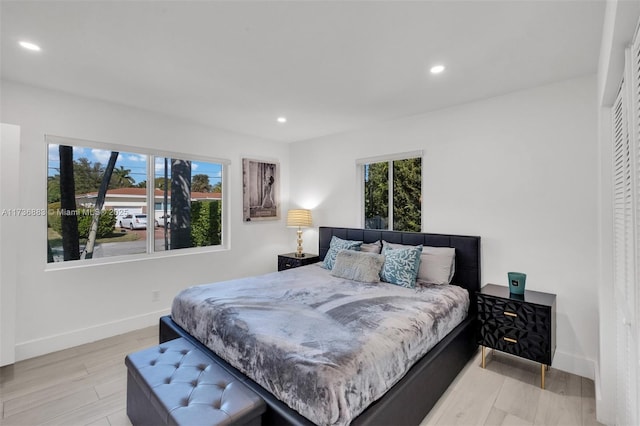 bedroom featuring light wood-type flooring