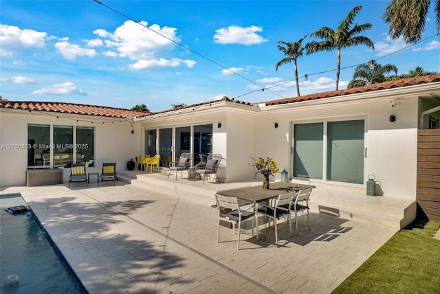 rear view of house with a patio area