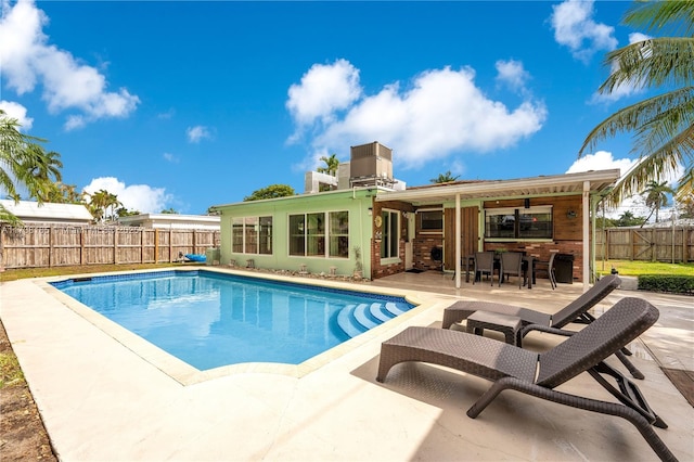 view of pool featuring a patio area