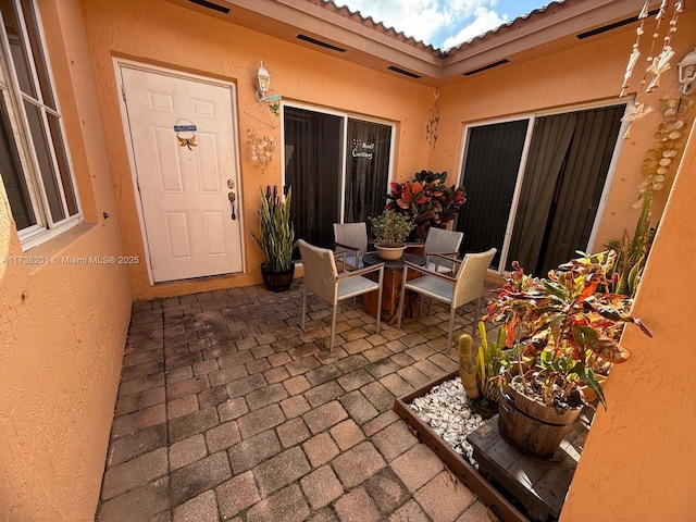 view of patio / terrace with visible vents