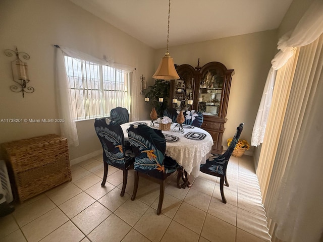 dining room featuring light tile patterned floors