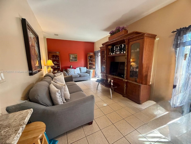 living room featuring light tile patterned floors