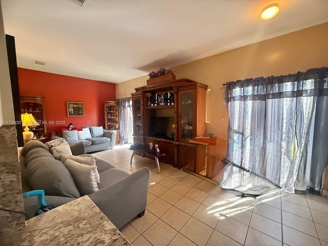 living room featuring light tile patterned flooring