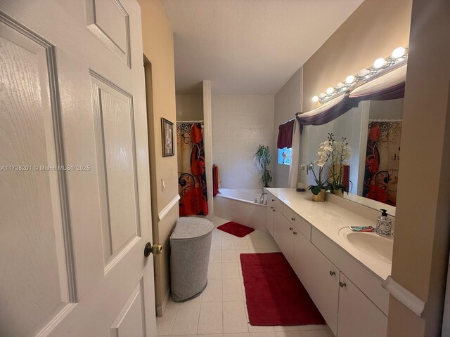 bathroom featuring vanity and tile patterned flooring