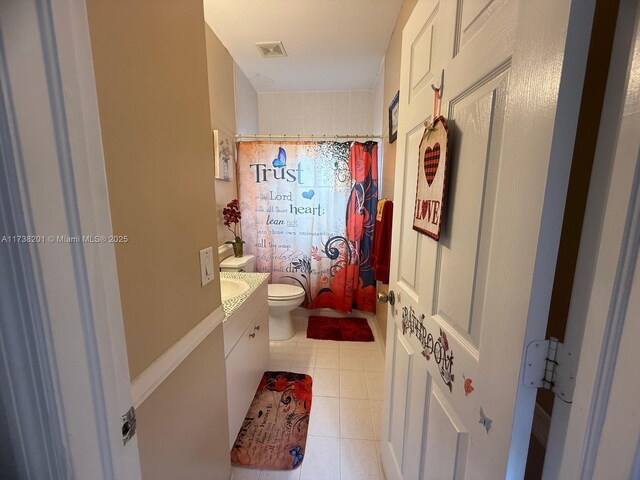 11224 SW 231st Ln, Miami, FL 33170 - full bath featuring toilet, vanity, tile patterned flooring, and curtained shower