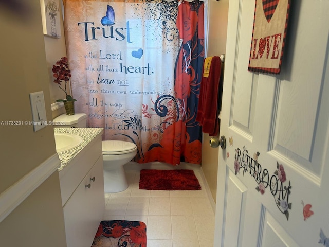 bathroom featuring vanity, toilet, curtained shower, and tile patterned flooring