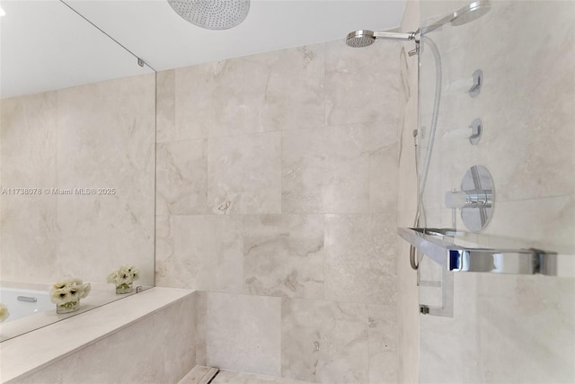 bathroom with tiled shower