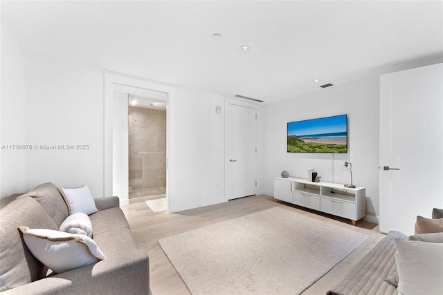 living room featuring light wood-type flooring