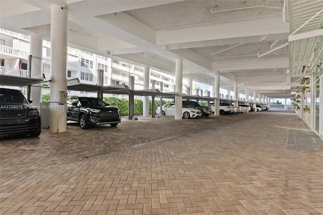 view of car parking featuring a carport