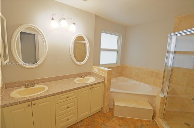 bathroom featuring tile patterned floors, vanity, and plus walk in shower