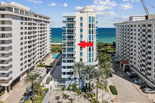 view of building exterior with a water view