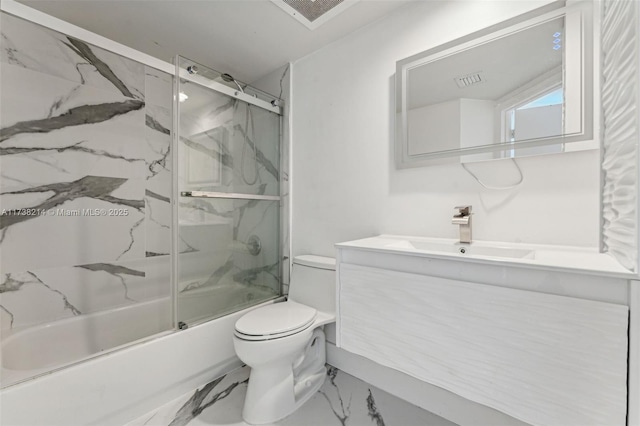 full bathroom with vanity, combined bath / shower with glass door, and toilet