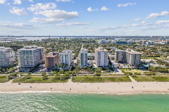 aerial view with a view of the beach and a water view