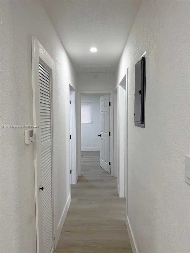 hall featuring light wood-type flooring