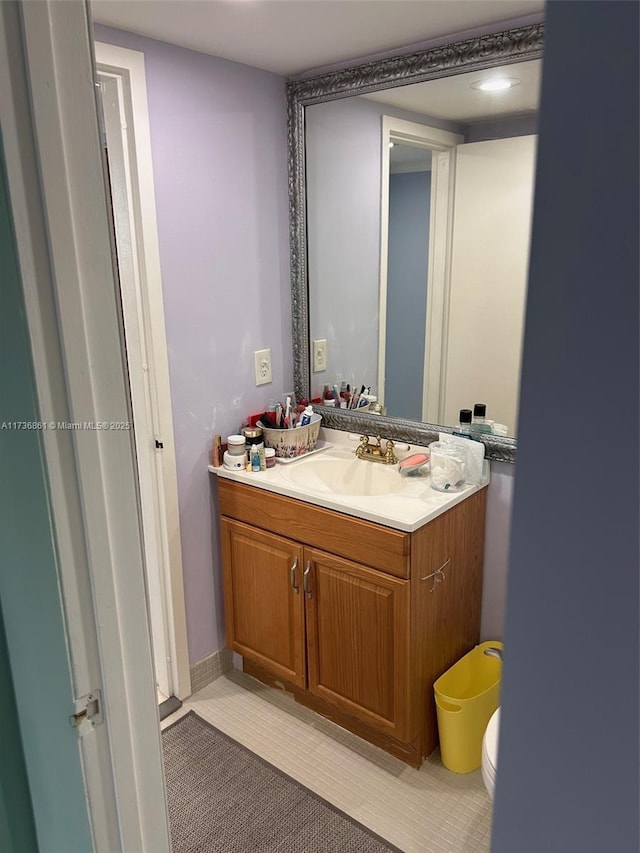 bathroom featuring vanity and tile patterned flooring