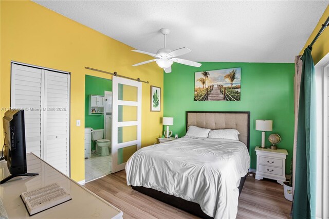 interior space featuring french doors, ceiling fan, lofted ceiling, and light tile patterned flooring