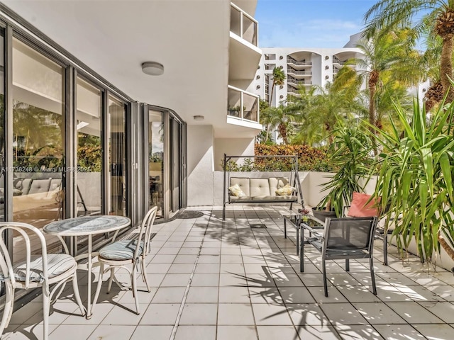 view of patio with a balcony