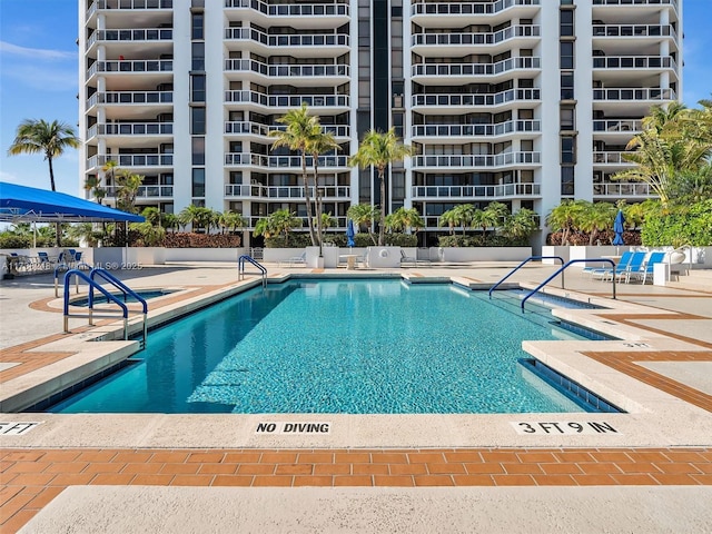 pool with a patio