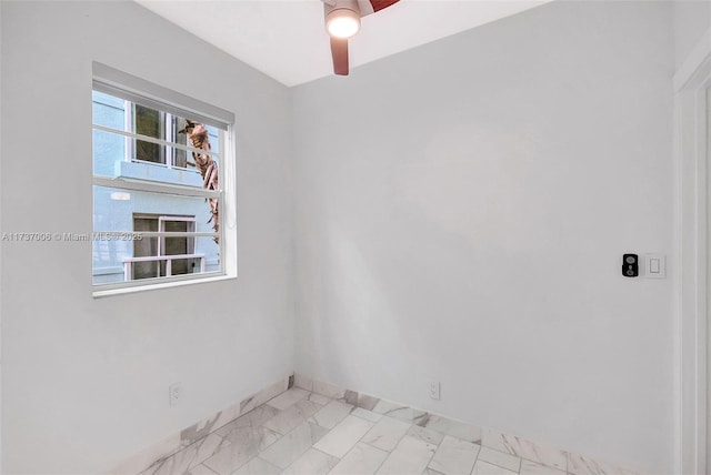 unfurnished room featuring ceiling fan