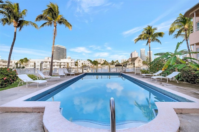 view of swimming pool with a patio