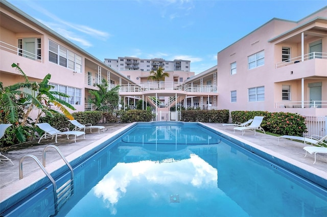 view of pool with a patio area