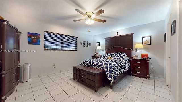 bedroom featuring light tile patterned floors and ceiling fan
