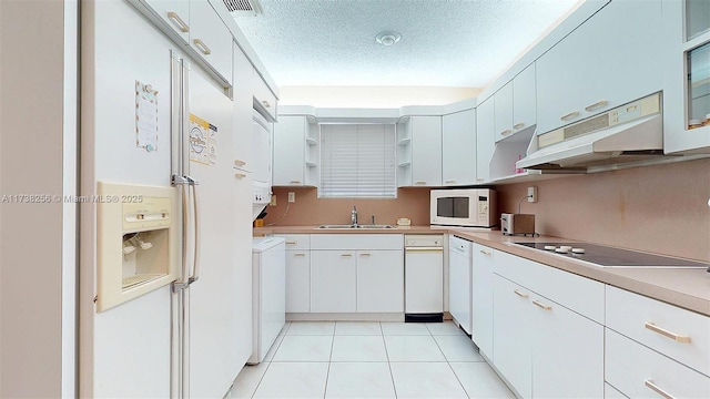 kitchen featuring white cabinetry, white appliances, sink, and a textured ceiling