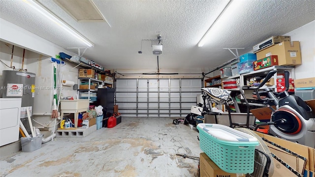 garage with water heater, washer / dryer, sink, and a garage door opener