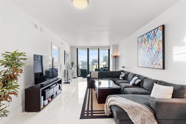 living room with floor to ceiling windows