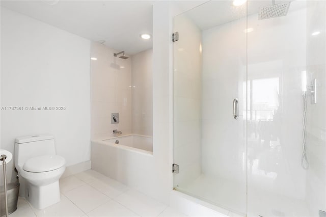 bathroom with toilet, separate shower and tub, and tile patterned flooring