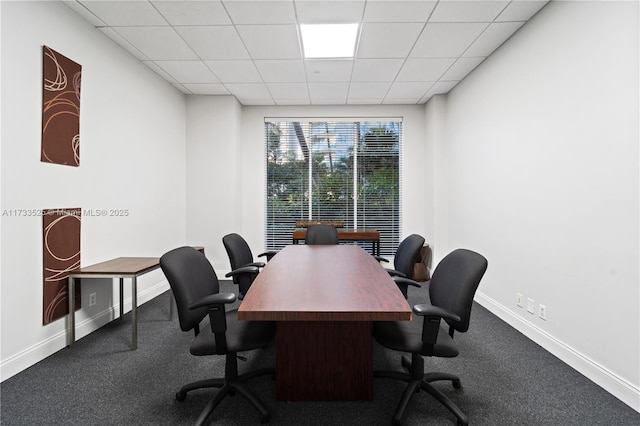 office with carpet, a paneled ceiling, and baseboards