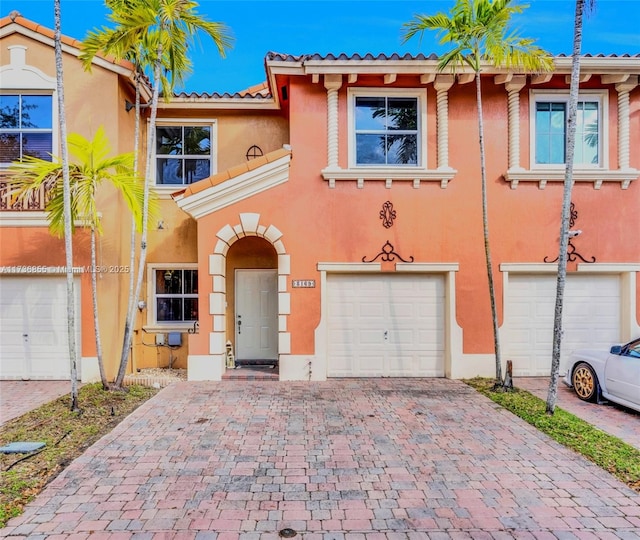 view of front of home with a garage