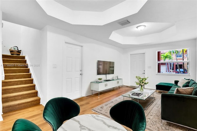 hallway with hardwood / wood-style floors