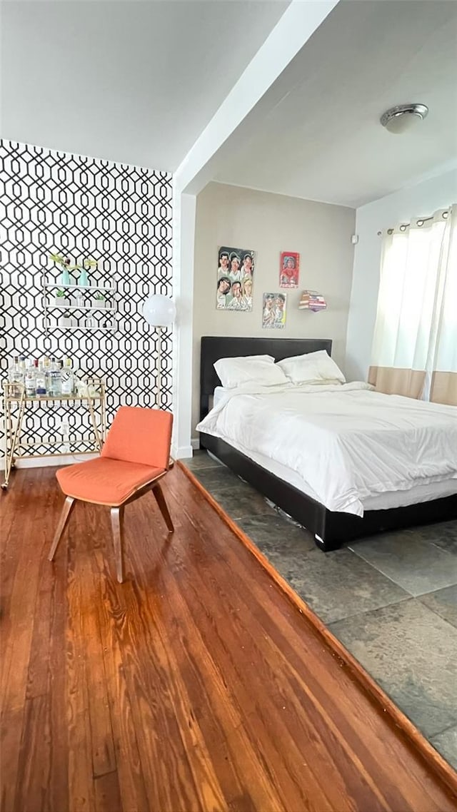 bedroom featuring hardwood / wood-style floors