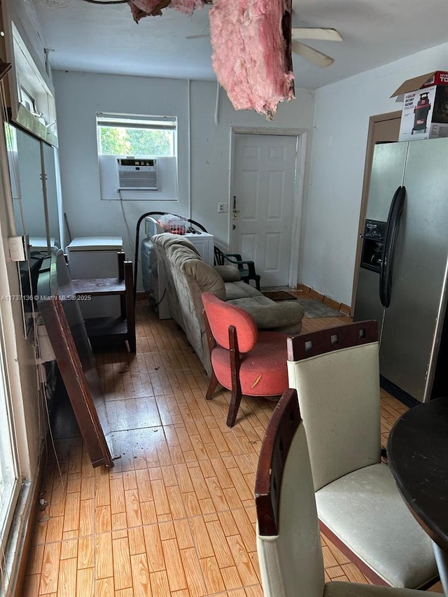 kitchen featuring cooling unit, ceiling fan, stainless steel fridge, and light hardwood / wood-style floors