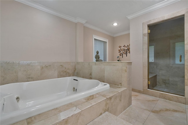 bathroom featuring ornamental molding and plus walk in shower