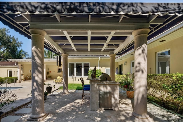 view of patio with an outdoor kitchen