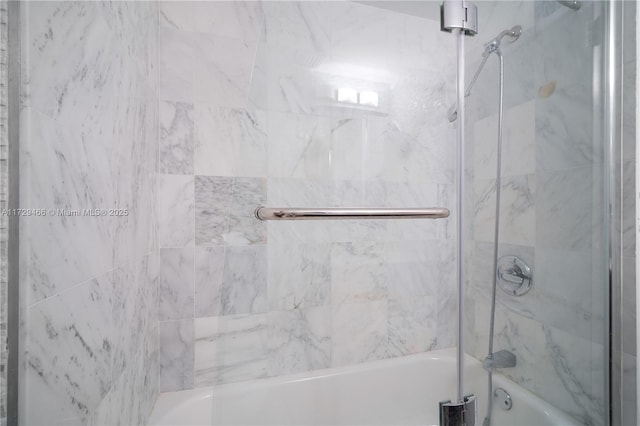 bathroom featuring enclosed tub / shower combo