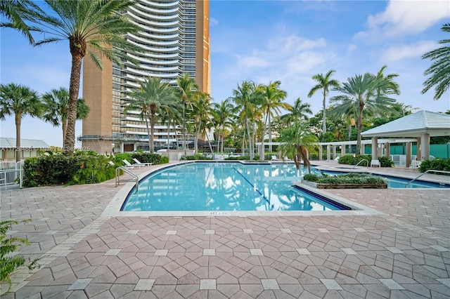 view of pool featuring a gazebo and a patio