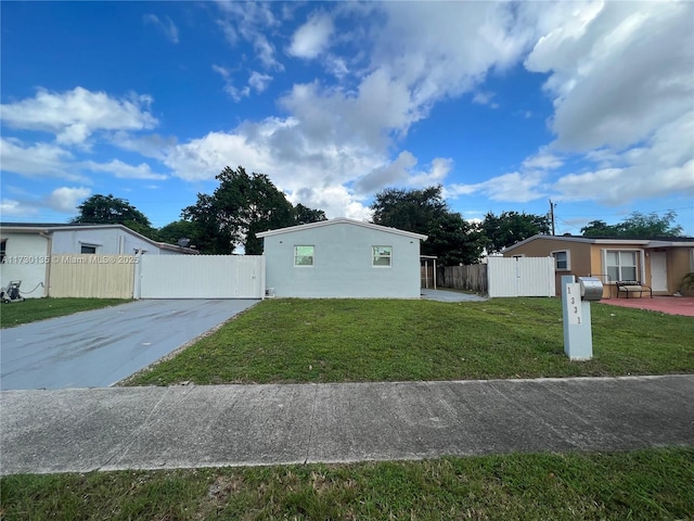 view of side of home featuring a yard