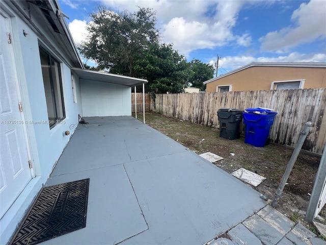 view of patio / terrace with a carport