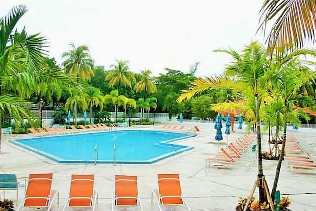 view of swimming pool featuring a patio