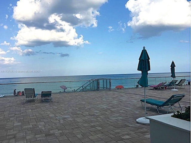 view of patio / terrace featuring a water view