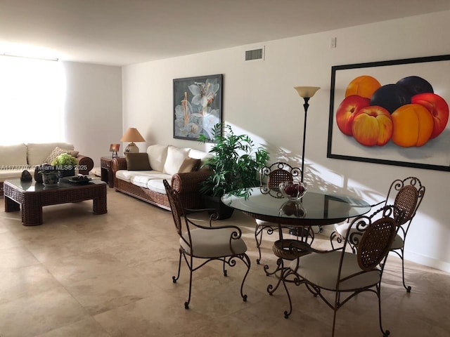 dining space featuring visible vents