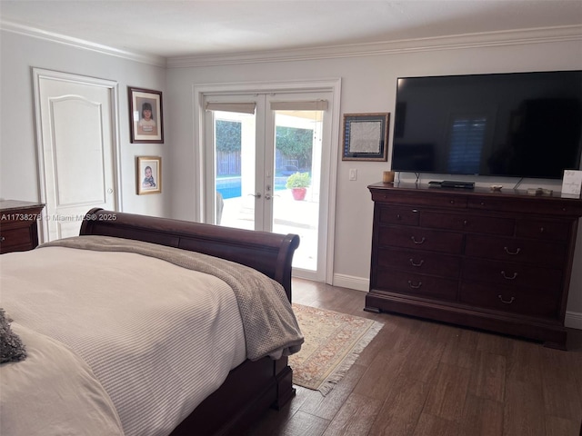 bedroom with french doors, dark hardwood / wood-style floors, crown molding, and access to outside